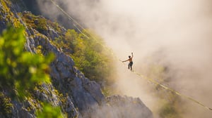 Man on tightrope