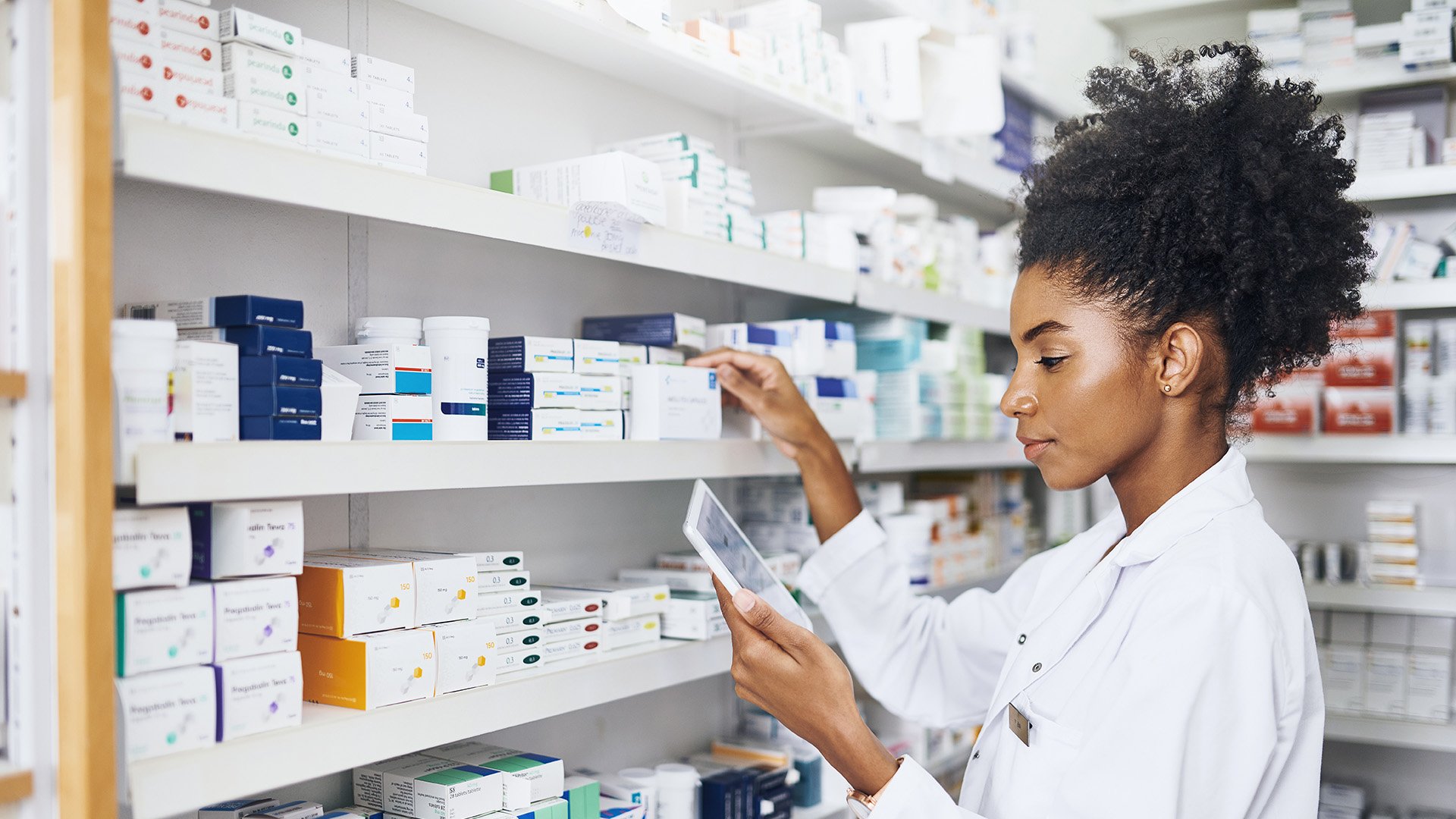 Woman checking hospital inventory